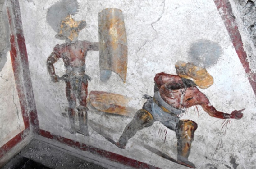 Pompei. Rinvenuto un altro affresco nella Regio V che raffigura due gladiatori al termine del combattimento