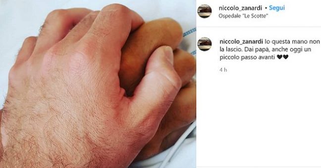 ‘Papà questa mano non la lascio’, fa commuovere il web la foto del figlio di Zanardi