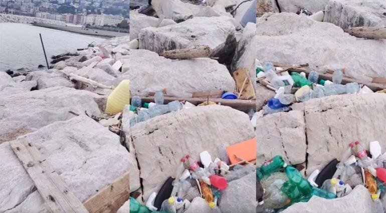 Napoli, alla Rotonda Diaz scogli e spiaggia ridotti a discarica. Il video