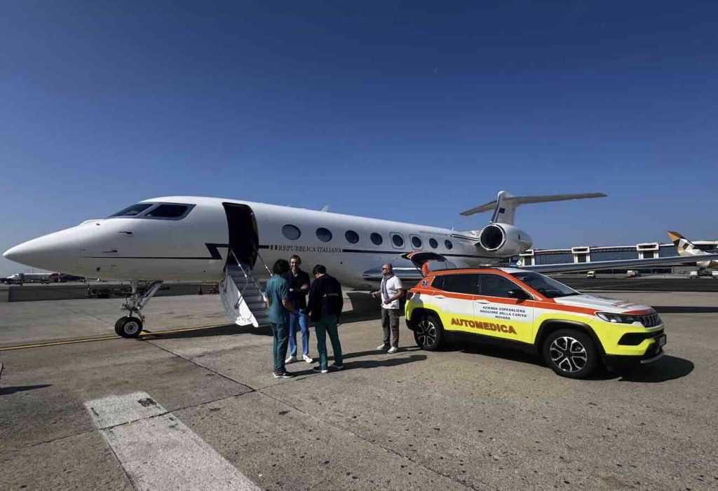 A newborn baby's life is in danger; an Air Force jet flies to Naples as a medical emergency.